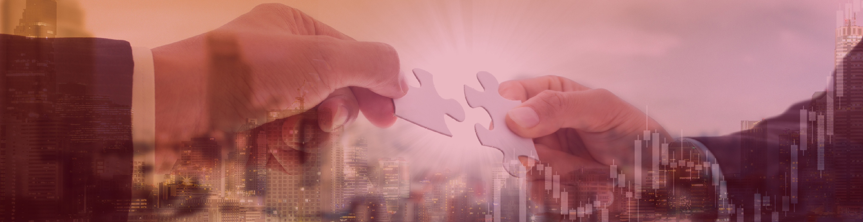 Two hands of businessmen joining puzzle pieces together on a screened bar charts and cityscape background