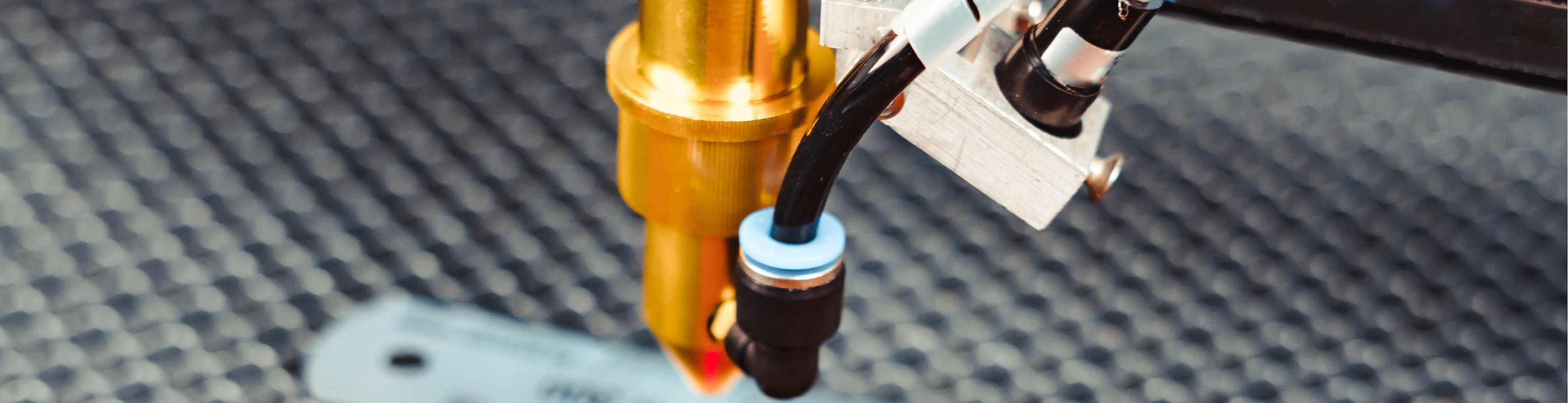 Closeup of laser measurement and cutting device